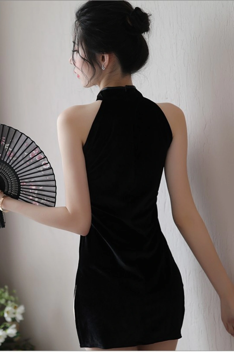Backless view of vintage cheongsam lingerie in black velvet with sleek design.