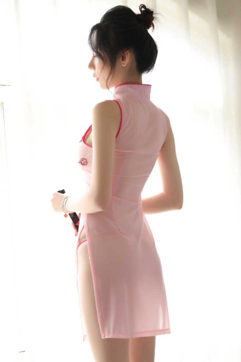 Model wearing pink backless wholesale erotic cheongsam lingerie with high side slit design