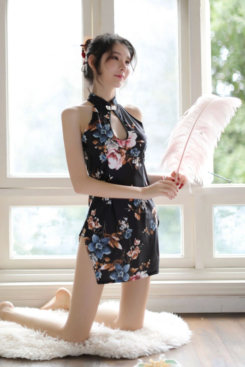 Elegant woman kneeling in b2b floral cheongsam lingerie featuring floral print on black base