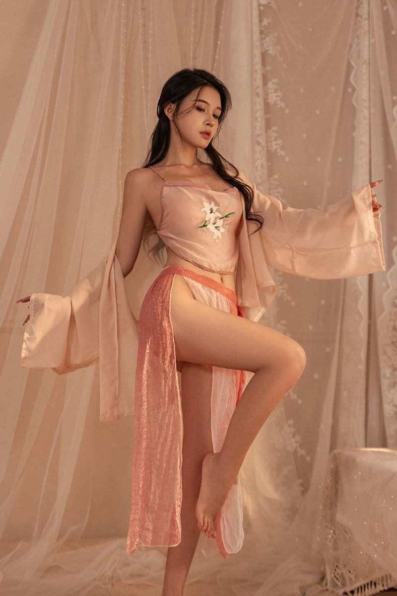 Model wearing elegant pink lace hanfu lingerie with floral embroidery