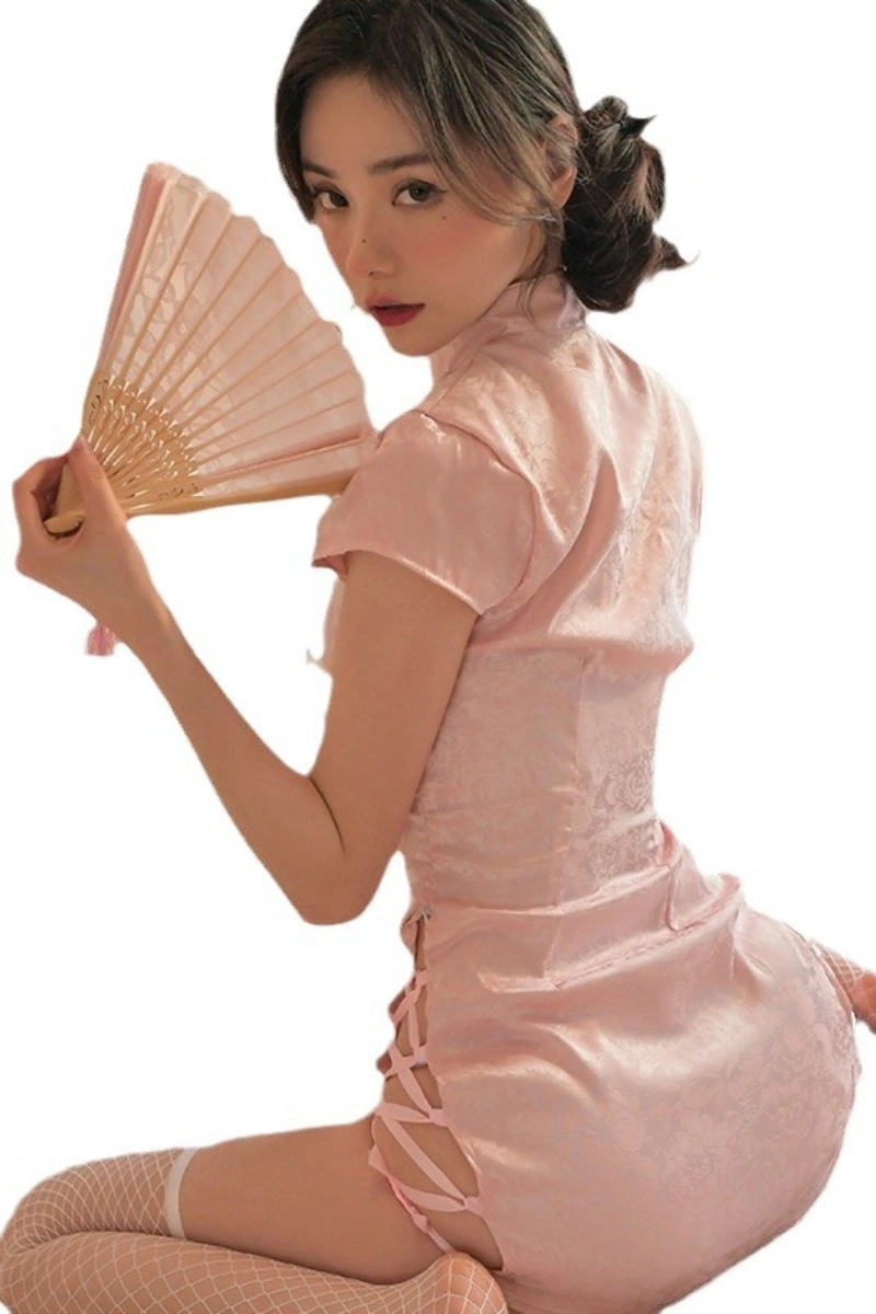 Alt text:Model in pink wholesale chinese empress lingerie holding a traditional fan