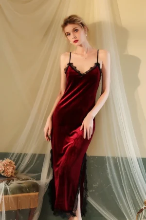 Front view of wedding lace pajamas in luxurious red velvet, featuring a deep V neckline with black lace trim and side slit.