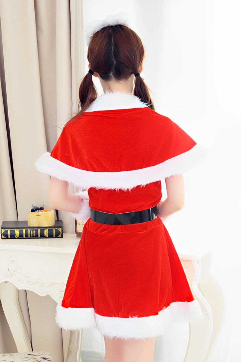 Alt Text: Model wearing elegant christmas lace lingerie with festive red velvet dress and white faux fur accents