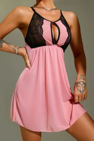 Front view of lace maternity pajamas in soft pink with black lace top and keyhole design