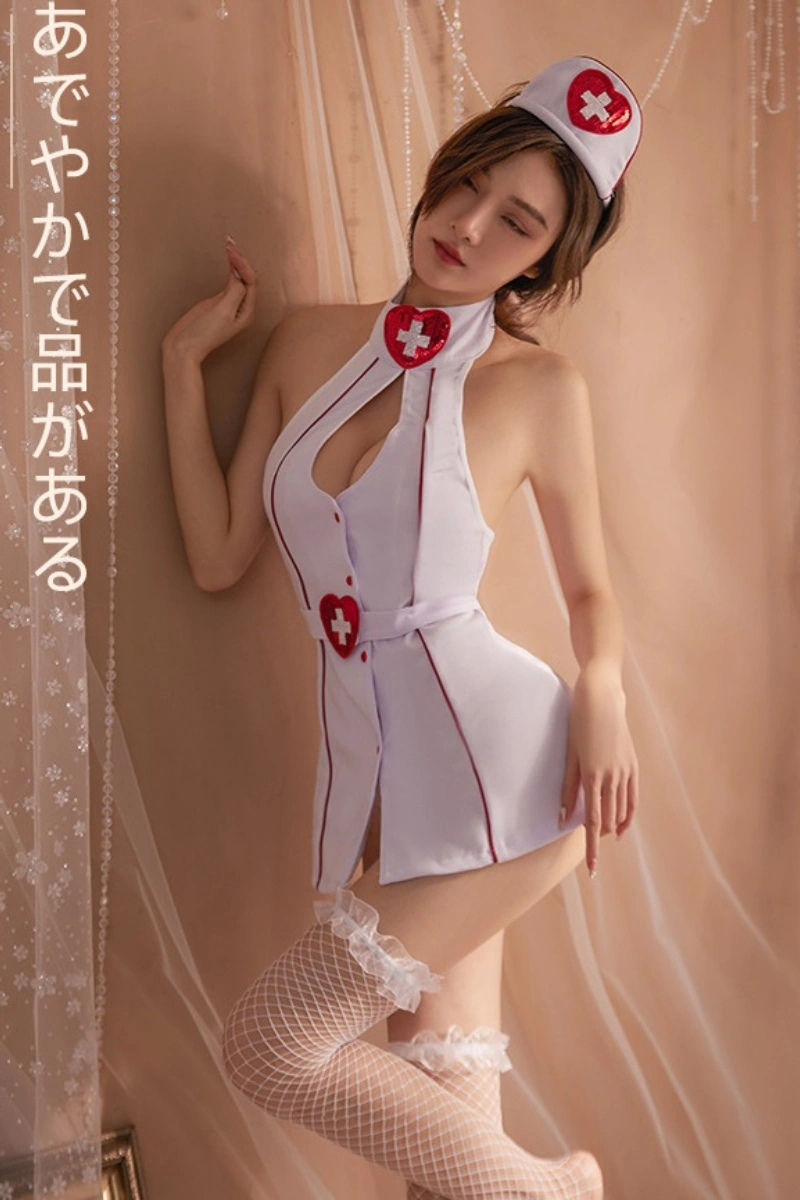 Model posing in a nurse uniform bodysuit with halter collar, red heart emblem, and body-hugging silhouette