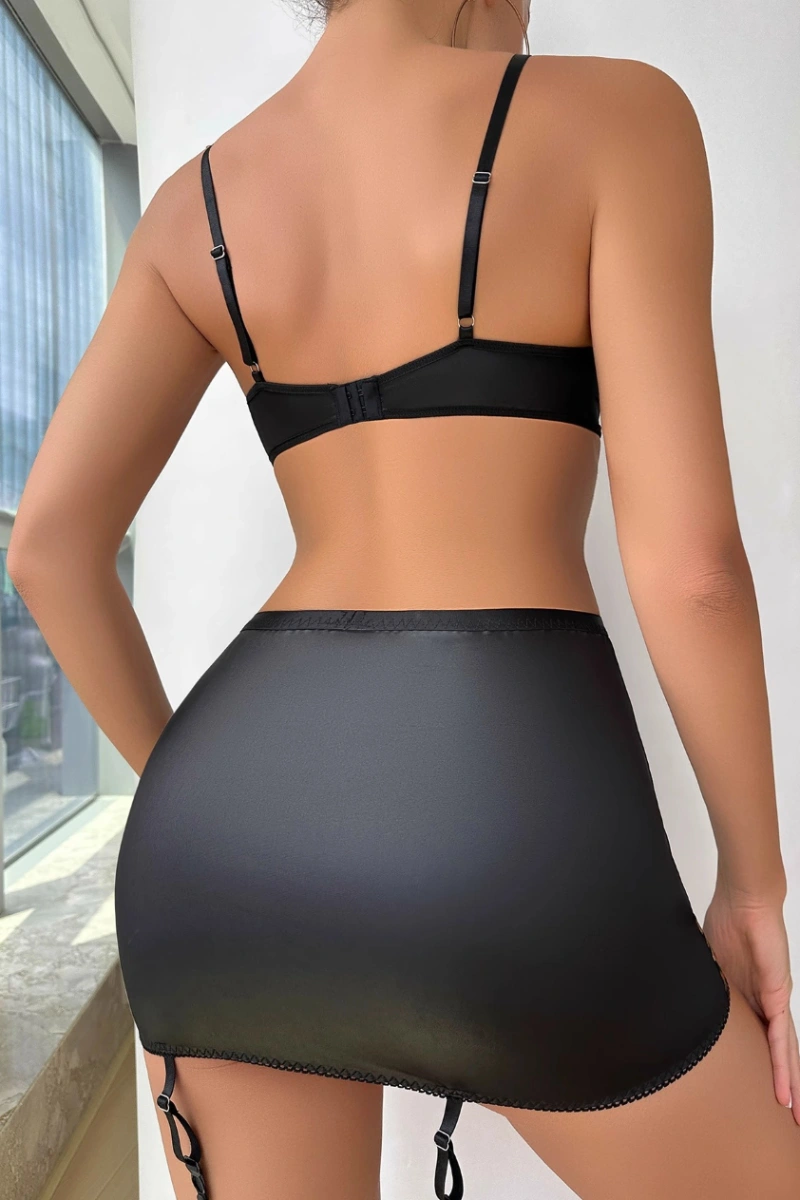 Alt Text:Elegant leopard lingerie set for women showing satin skirt from the back