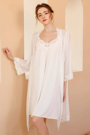 Alt text: Elegant long sexy nightgown in white with lace neckline and sheer robe
