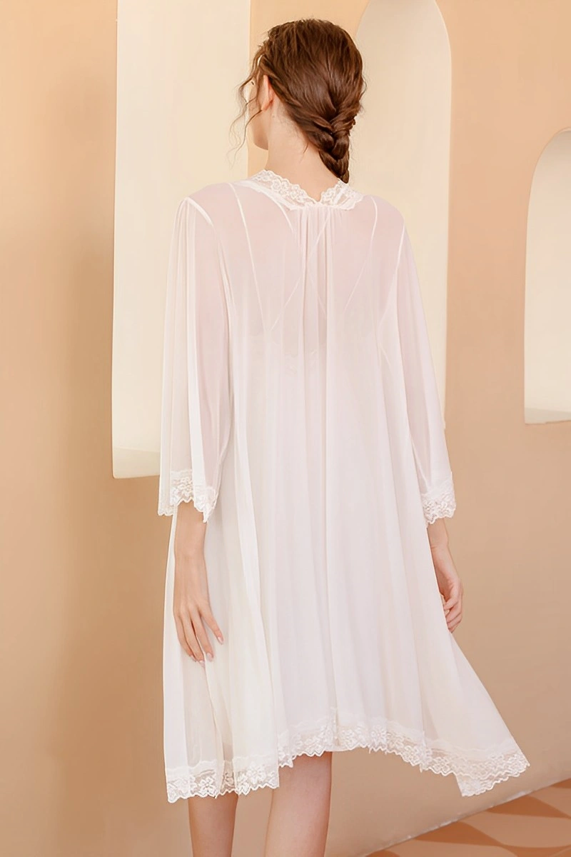 Alt text: White long sexy nightgown with sheer back design and lace hem