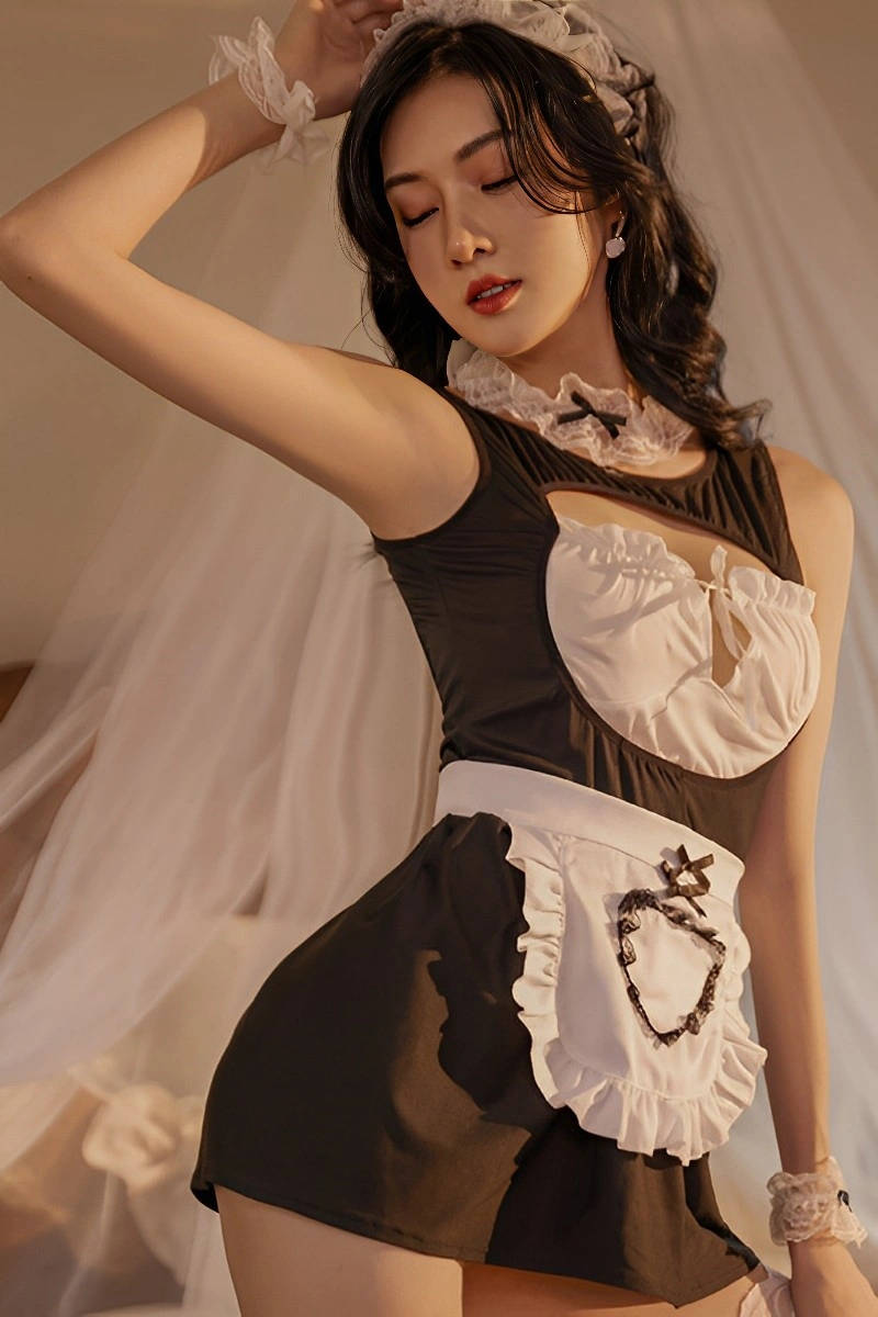Alt Text:Playful sexy Maid Costume in black and white with frilled apron