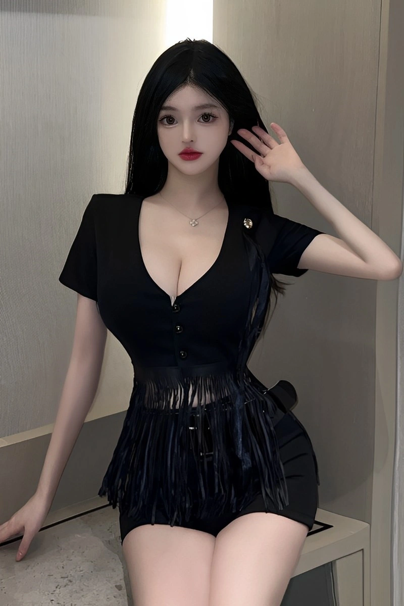 Model wearing Police Uniform Lingerie featuring a deep V-neck black crop top with button front and fringe design.