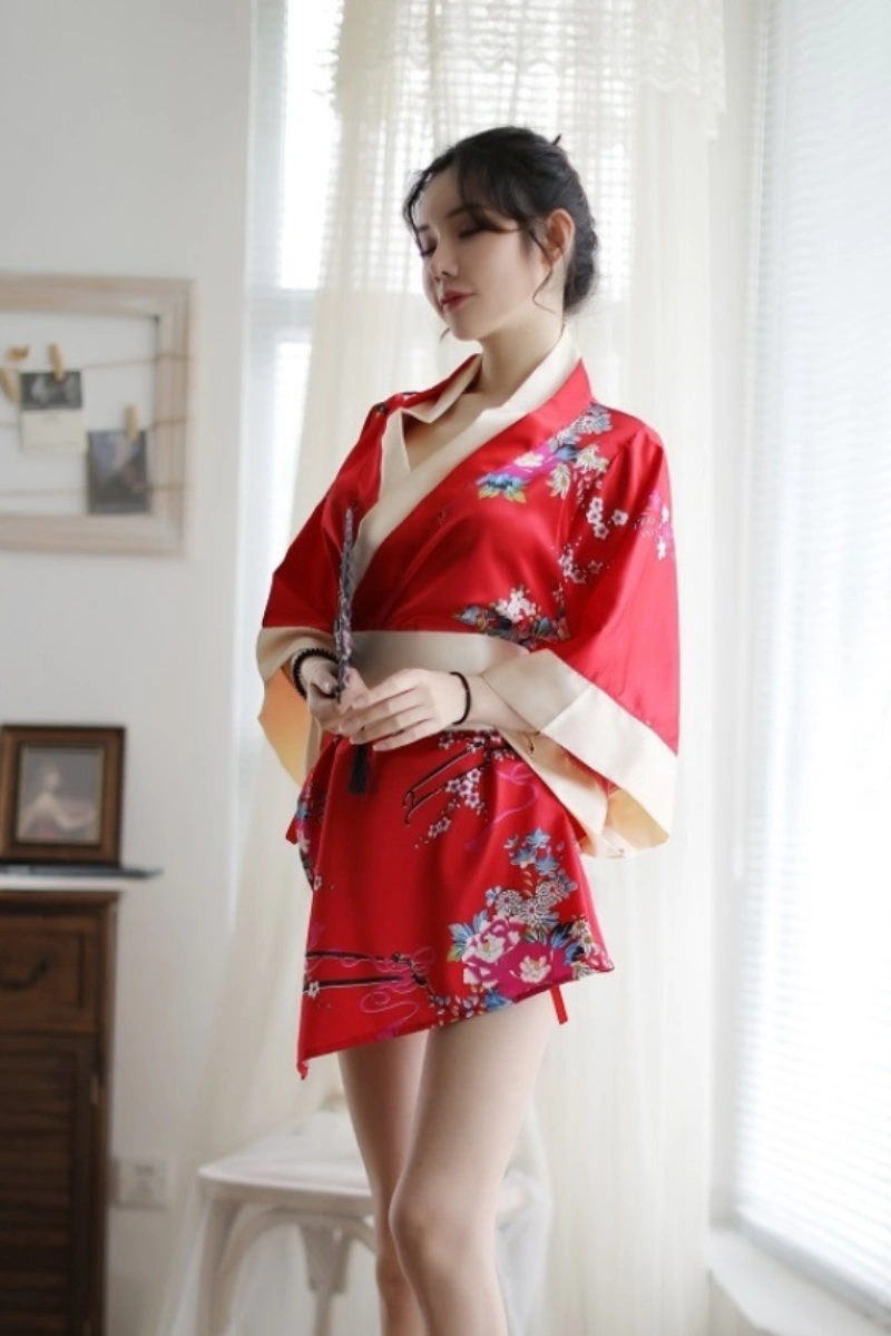 Model in red floral japanese kimono nightwear with satin waist belt