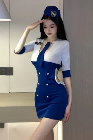 Woman wearing a Sexy Airline Attendant Costume in blue and white with a deep V-neck and tie.