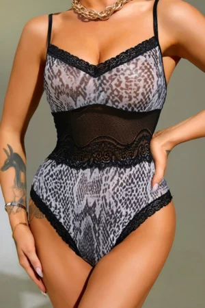 Front view of plus size Lace Pajamas in leopard print with black lace trim and sheer waist panel.