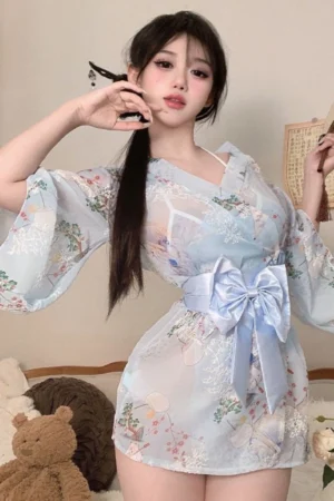 Alt Text： Model in a sheer blue japanese style sexy robe with floral kimono patterns and satin bow