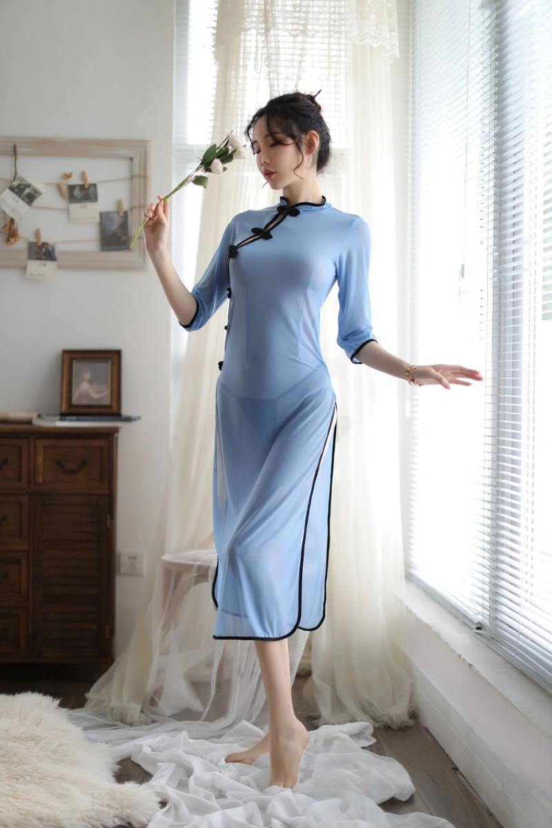 Model in sheer b2b blue cheongsam lingerie with traditional buttons and ankle-length design