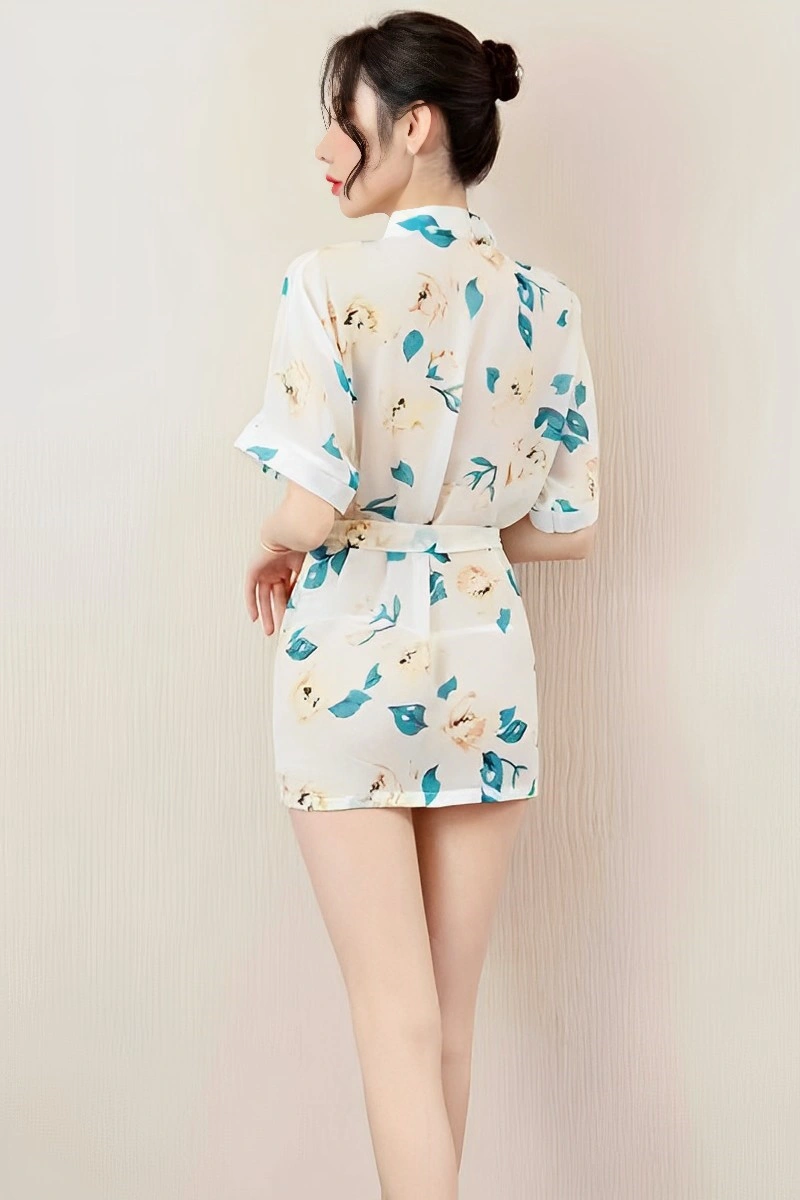 Alt Text:Wholesale Japanese Kimono Nightwear with white floral fabric and teal leaf prints, back view