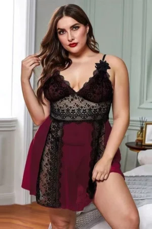 Curvy model showcasing deep purple wholesale lace pajama party outfit with black lace trim.
