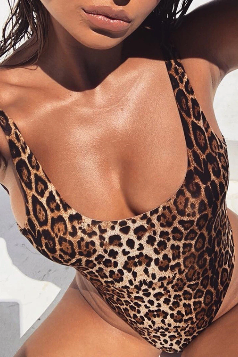 Alt text: Wholesale sexy leopard costume lingerie one-piece with deep scoop neckline