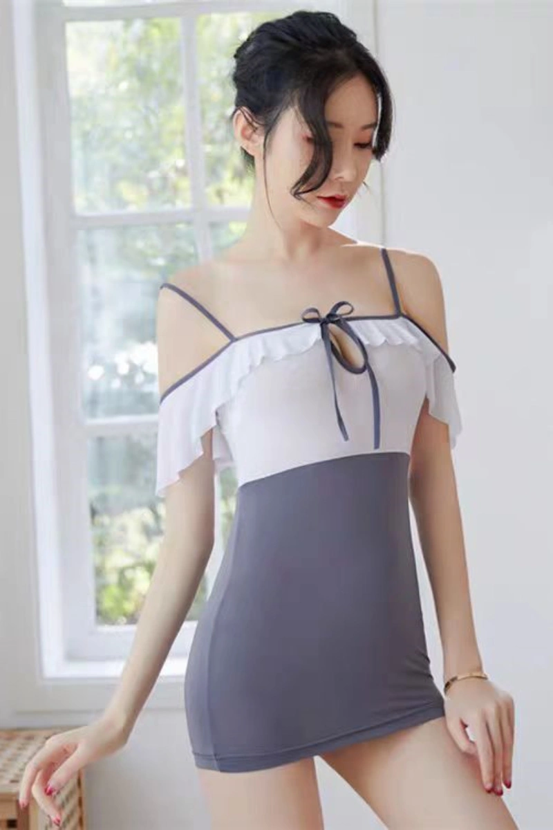 Model wearing gray and white mini dress paired with sheer stockings for wholesale sexy secretary stockings set.