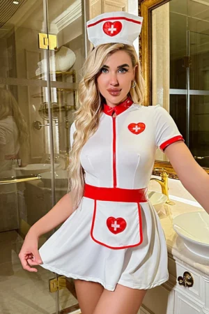 Front view of wholesale nurse costume for women with heart-shaped cross and matching nurse hat