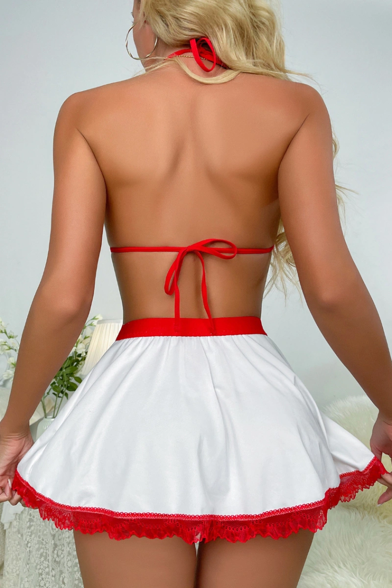 Back view of wholesale nurse fantasy costume showing open back and flared skirt with lace trim
