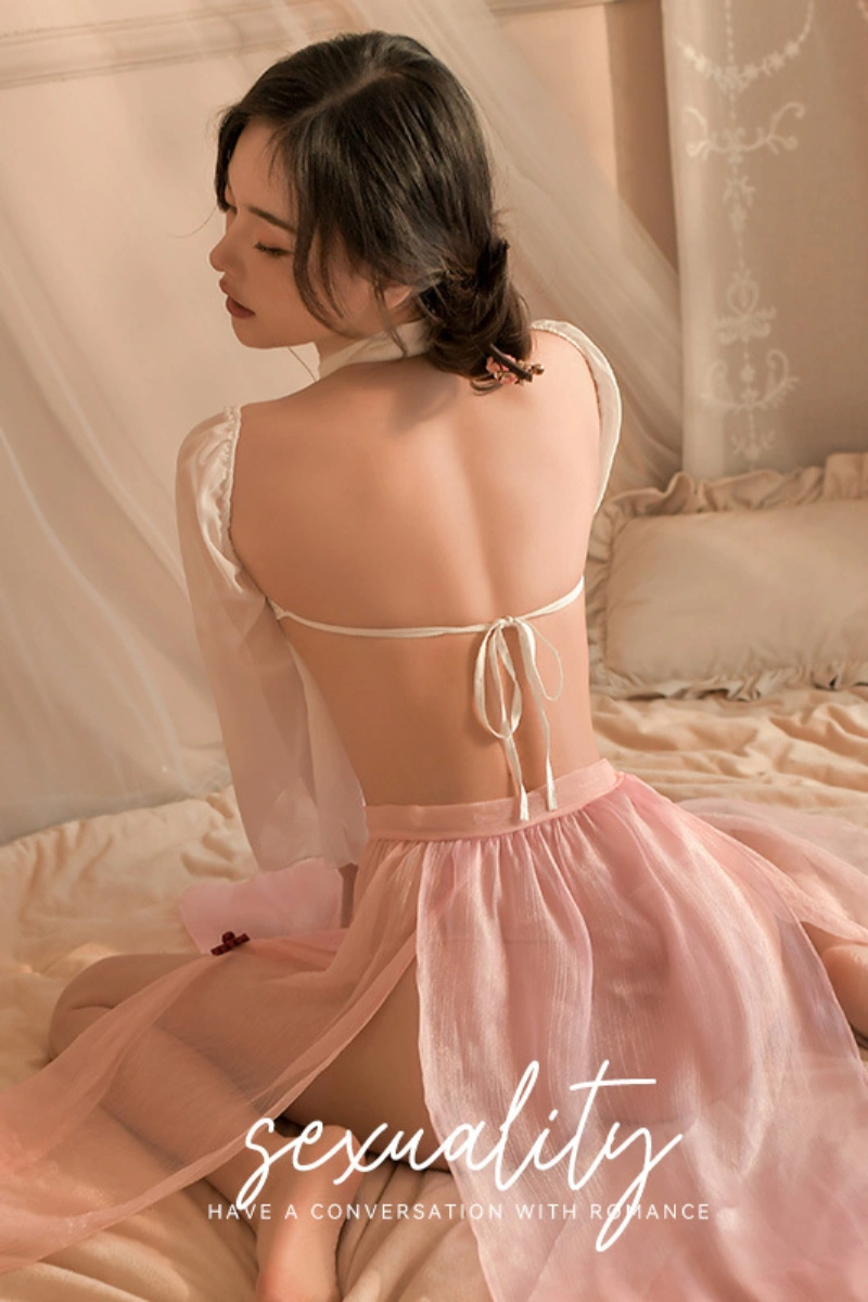 Alt Text: b2b Ancient Costume in white backless halter top and flowing pink sheer skirt