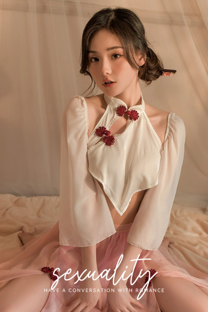 Alt Text: b2b Ancient Costume featuring a white halter top with floral buttons and a pink sheer skirt