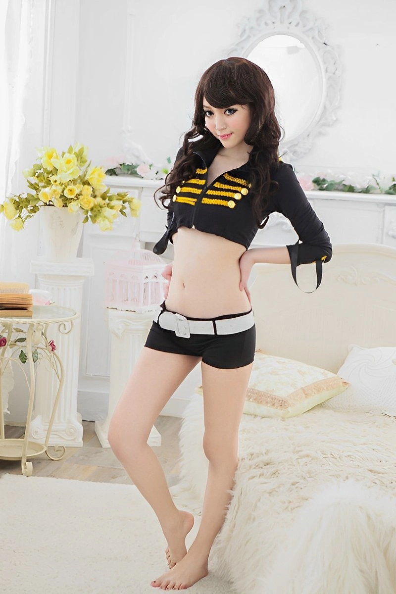 Sexy model in b2b Policewoman Costume wearing black crop jacket with gold buttons and shorts with white belt