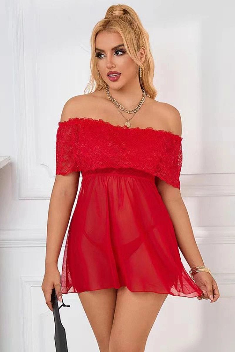 A plus size sexy secretary wearing a sheer red lace off-shoulder babydoll with flowing hemline.