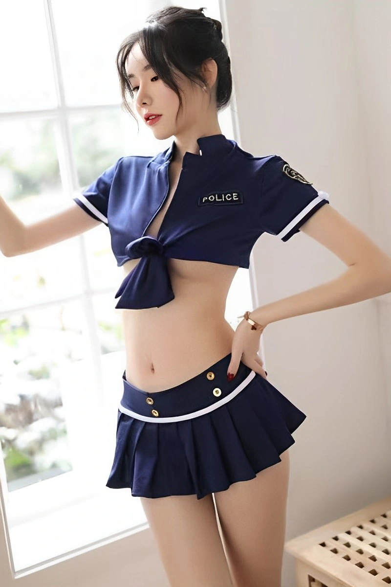 Sexy model in wholesale Policewoman Mini Dress navy blue crop top and pleated skirt front view