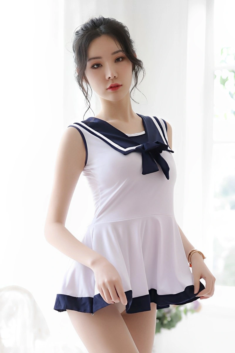 Front view of wholesale cute student uniform with navy blue bow and trim, designed for wholesale buyers.
