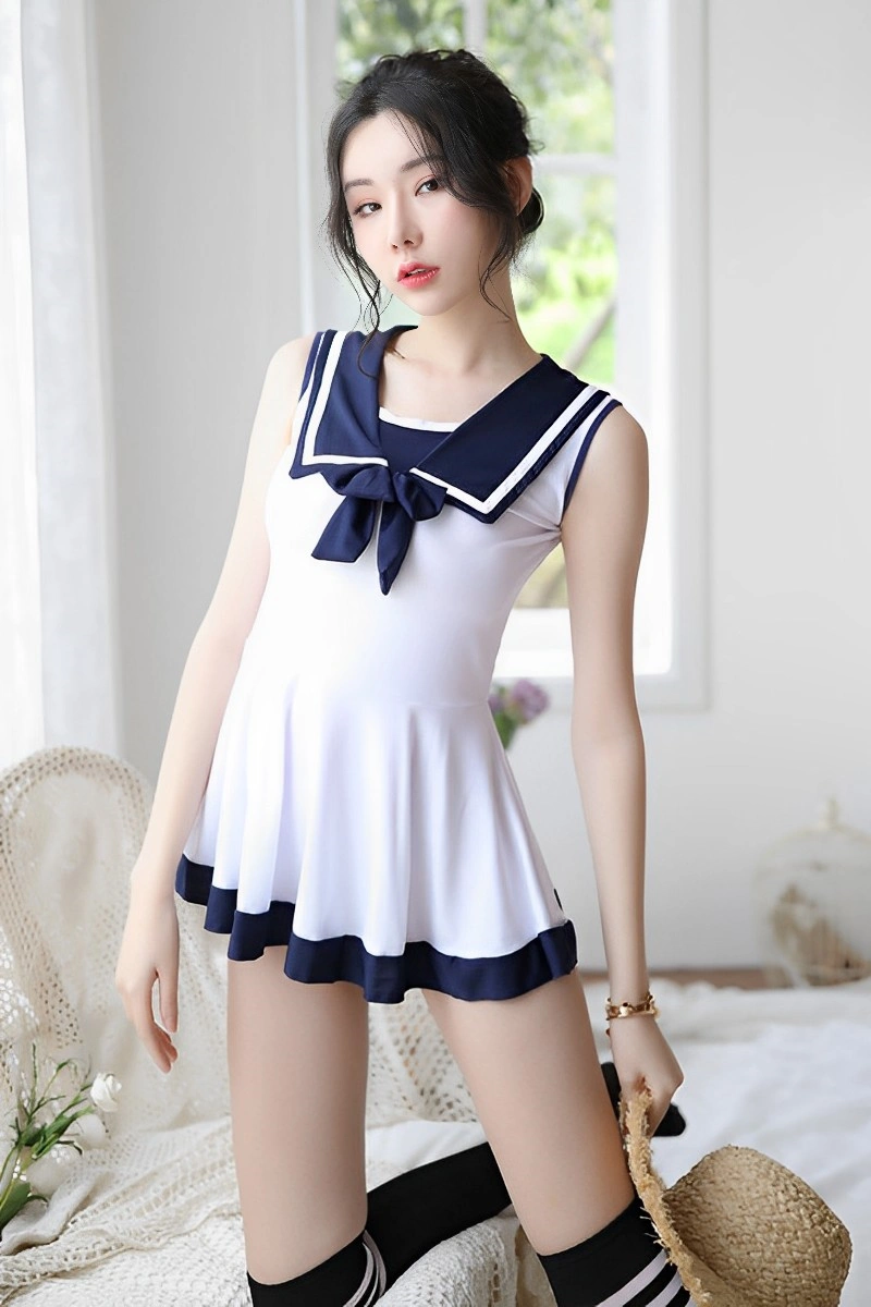 Wholesale cute student uniform in white and navy blue with sleeveless design, tailored for B2B wholesale.