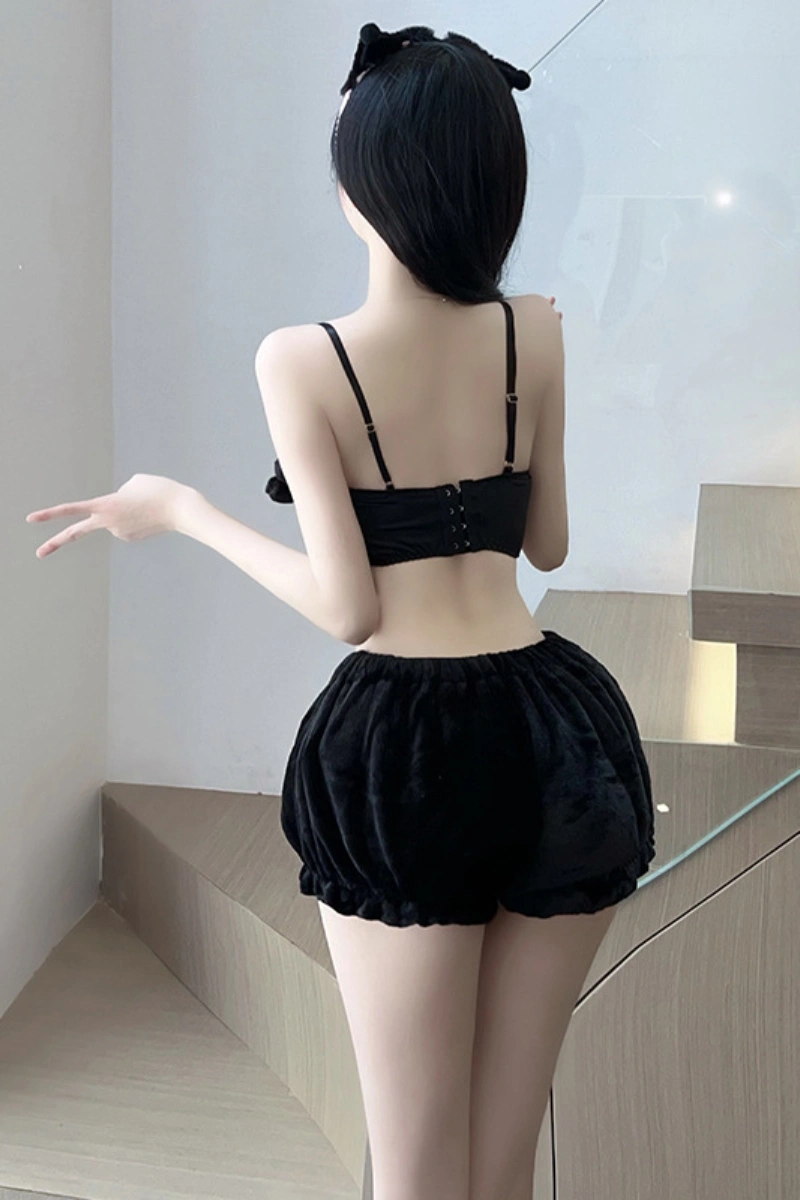 Back view of black b2b cute bunny lingerie set featuring a crop top and fluffy shorts.