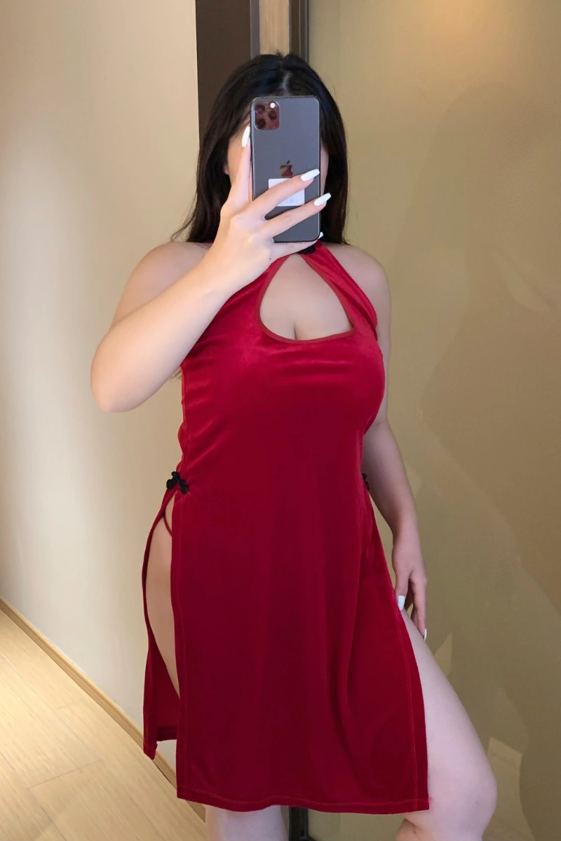 Front view of wholesale plus size cheongsam lingerie in red velvet with halter neckline and high side slit.