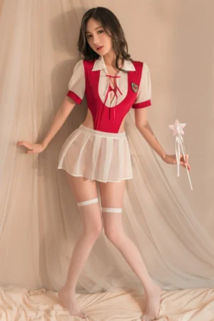 Model wearing a b2b student cosplay costume featuring a red fitted top, white collar, lace-up front, and sheer mini skirt.