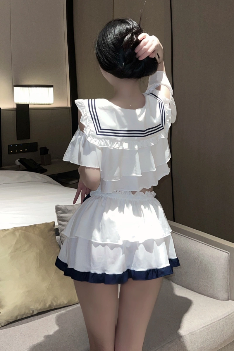 Back view of wholesale JK lace student lingerie showing sailor collar, layered skirt, and navy trim for a cute student uniform style.