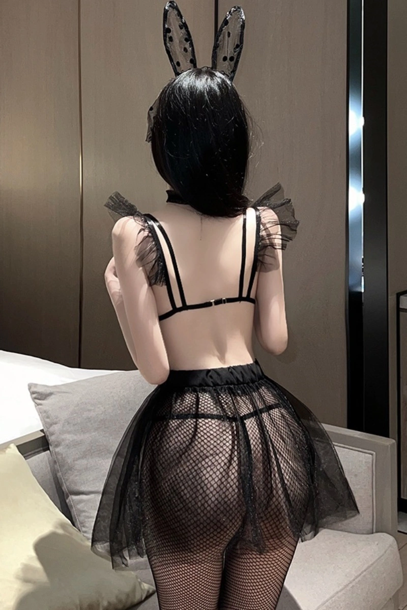 Back view of wholesale bunny lingerie for women, showing sheer mesh skirt, open back straps, and fishnet details.
