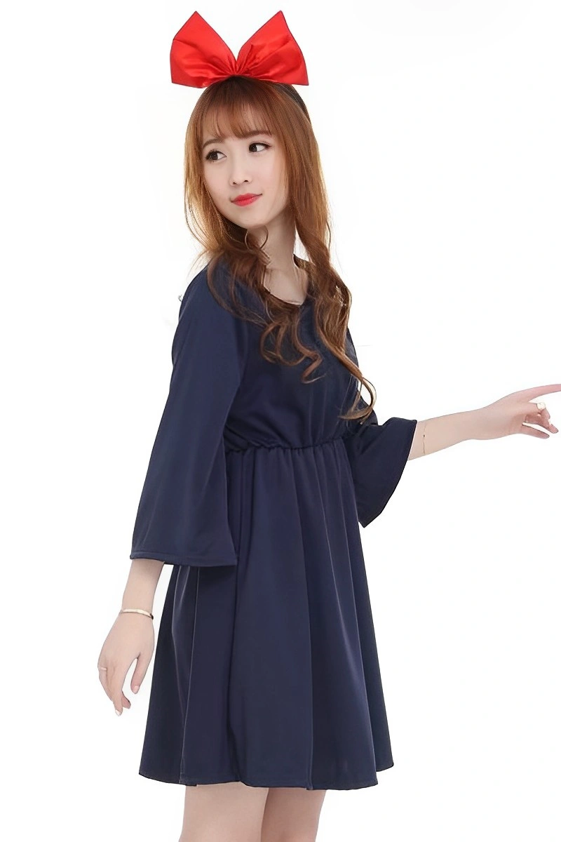 Side view of navy school girl costume dress paired with red bow headband