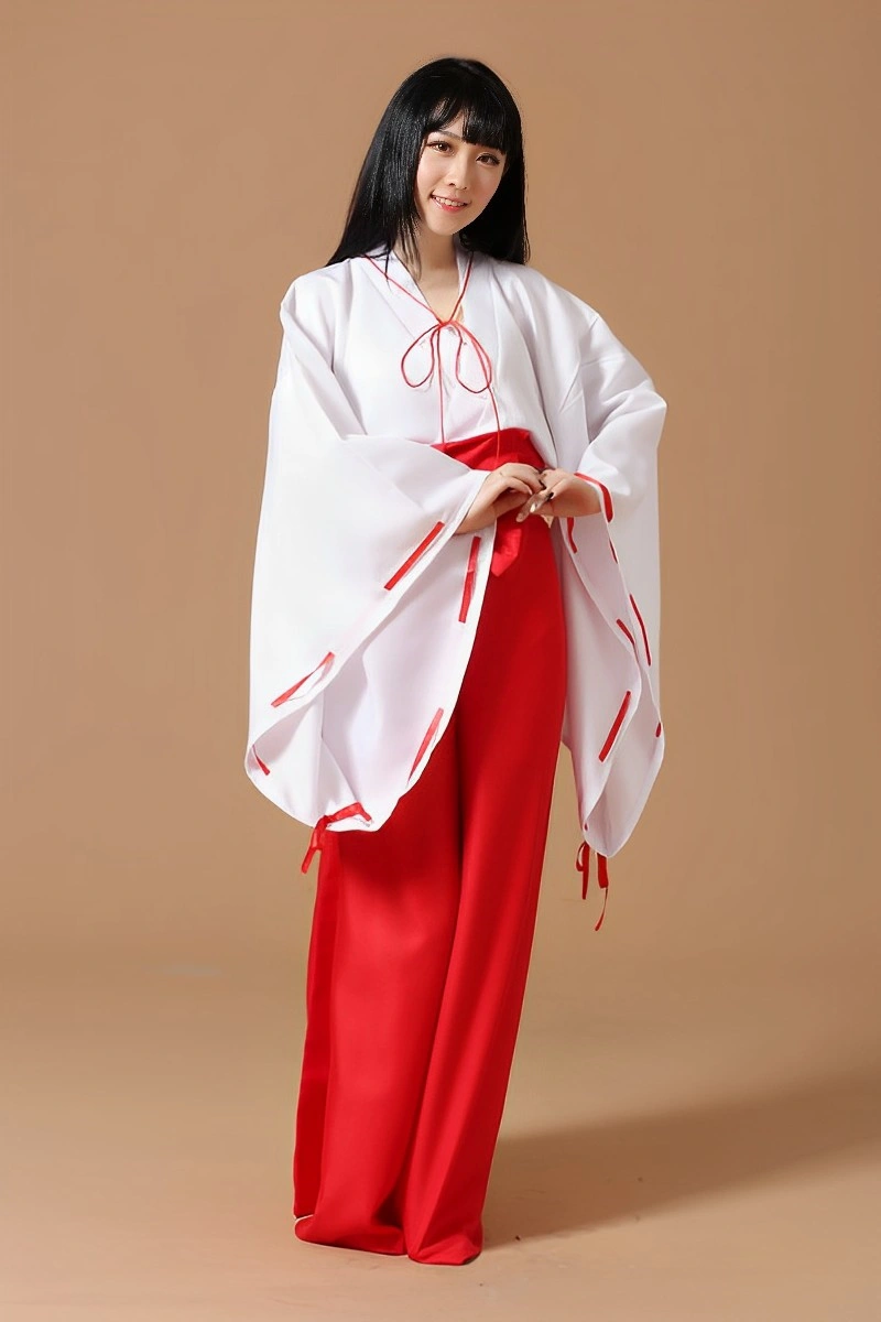 Japanese Shrine Maiden Costume featuring a flowing white kimono top with red accents and matching red hakama pants.