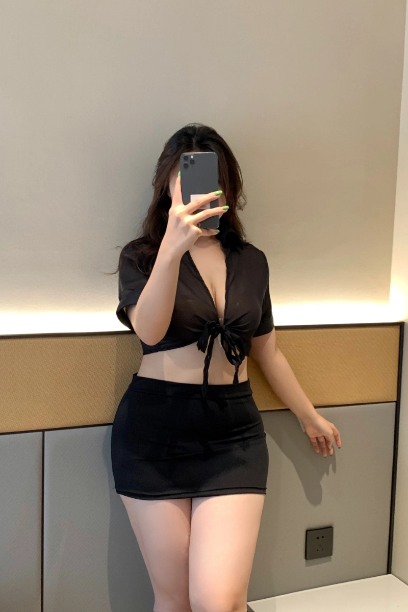 Alt: Bulk long lace pajamas set with sheer black short-sleeve shirt and skirt