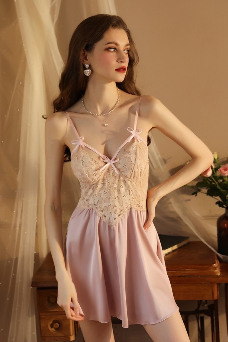 Model wearing pink custom silk Lace Pajamas with lace bodice