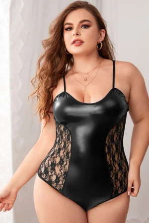 Model wearing B2B black lace pajamas featuring faux leather front and lace mesh side cutouts