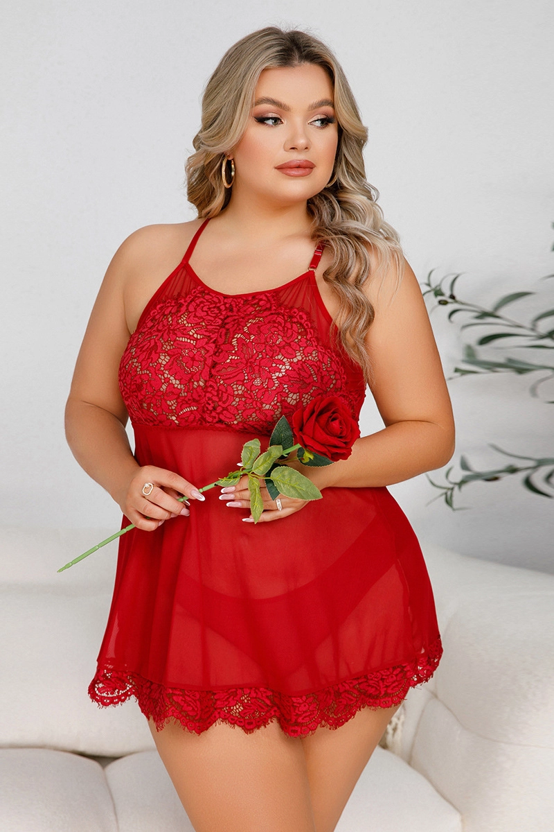 Model in red wholesale lace pajamas holding a rose, wearing floral lace and mesh sheer fabric