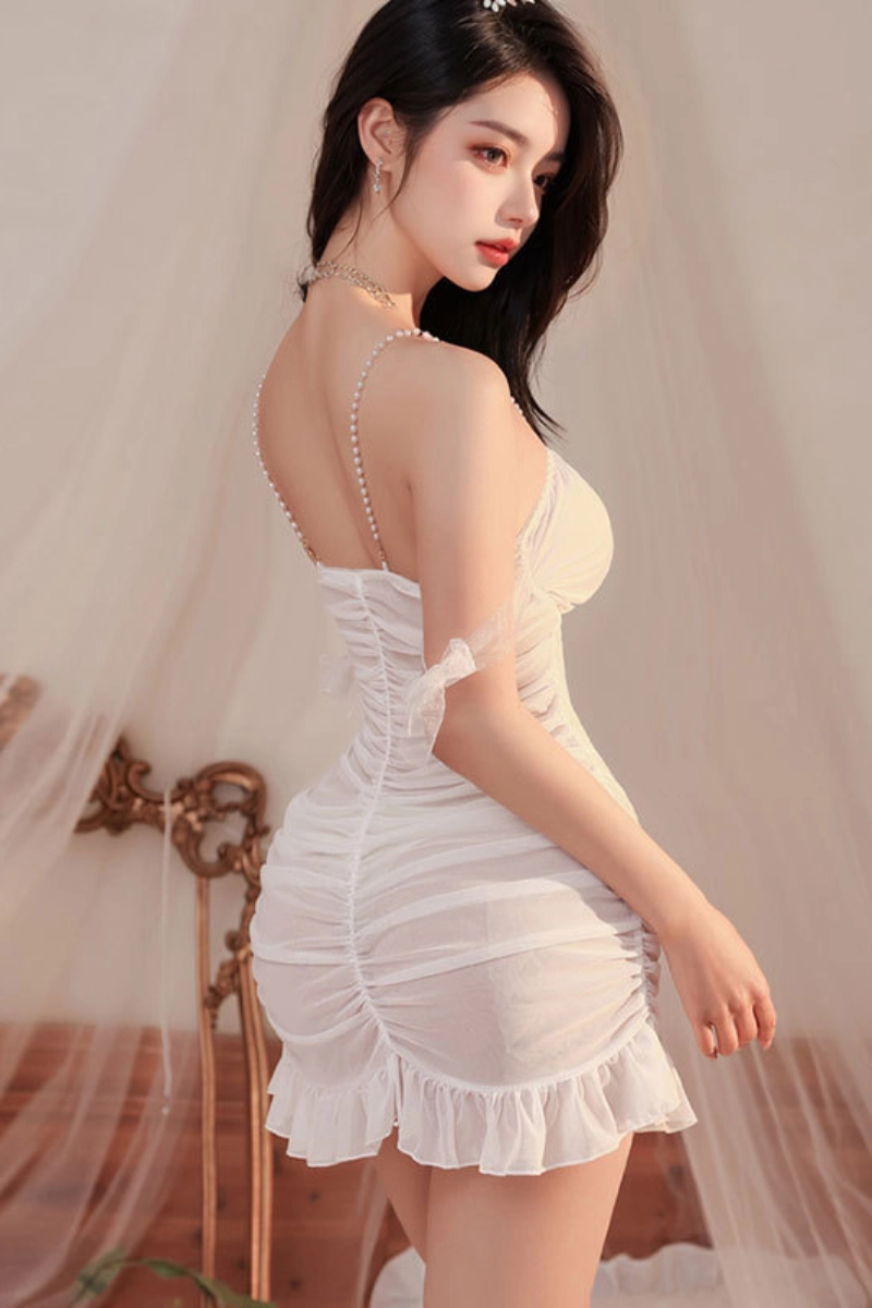 alt:Back view of white bulk lace gauze Pajamas with ruffled hem design