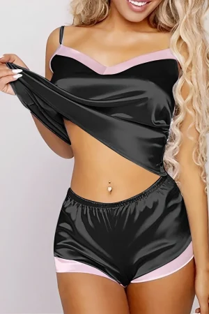 Black custom lace up pajamas with light pink trim and satin fabric