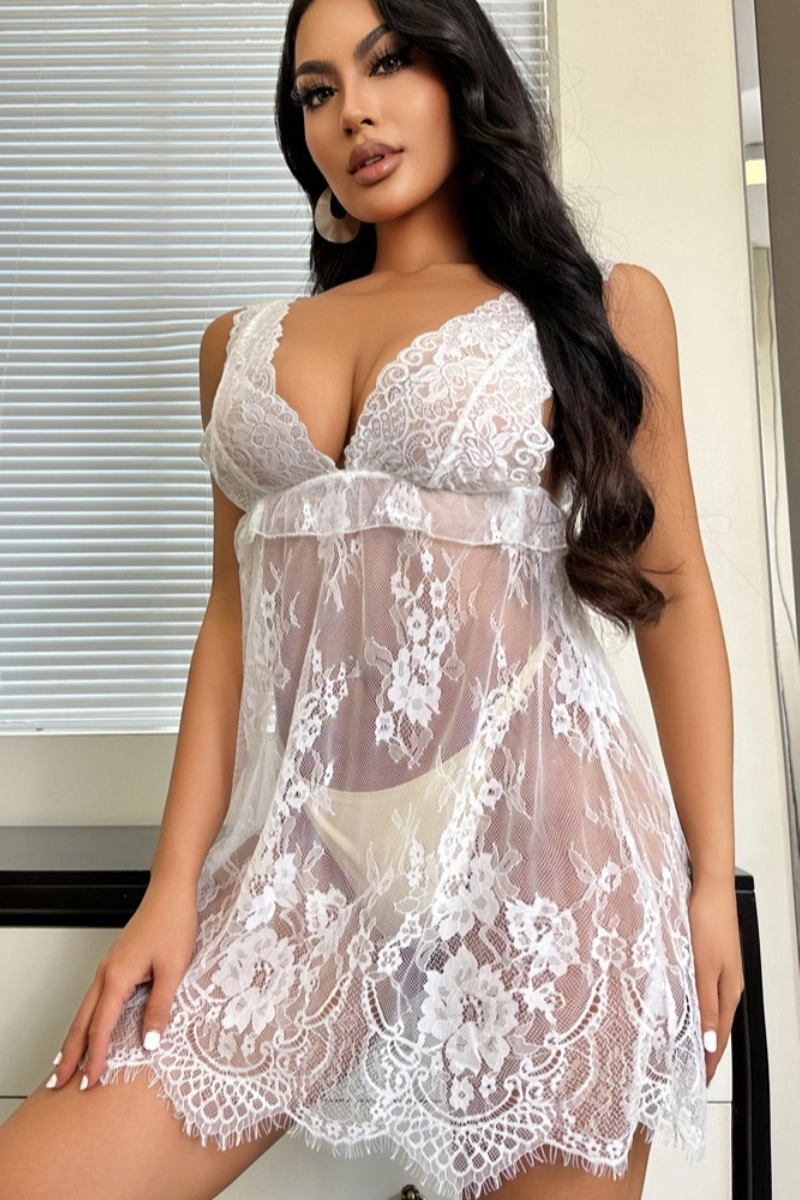 Alt Text:custom Victorian lace pajama featuring floral embroidery and sheer white lace front