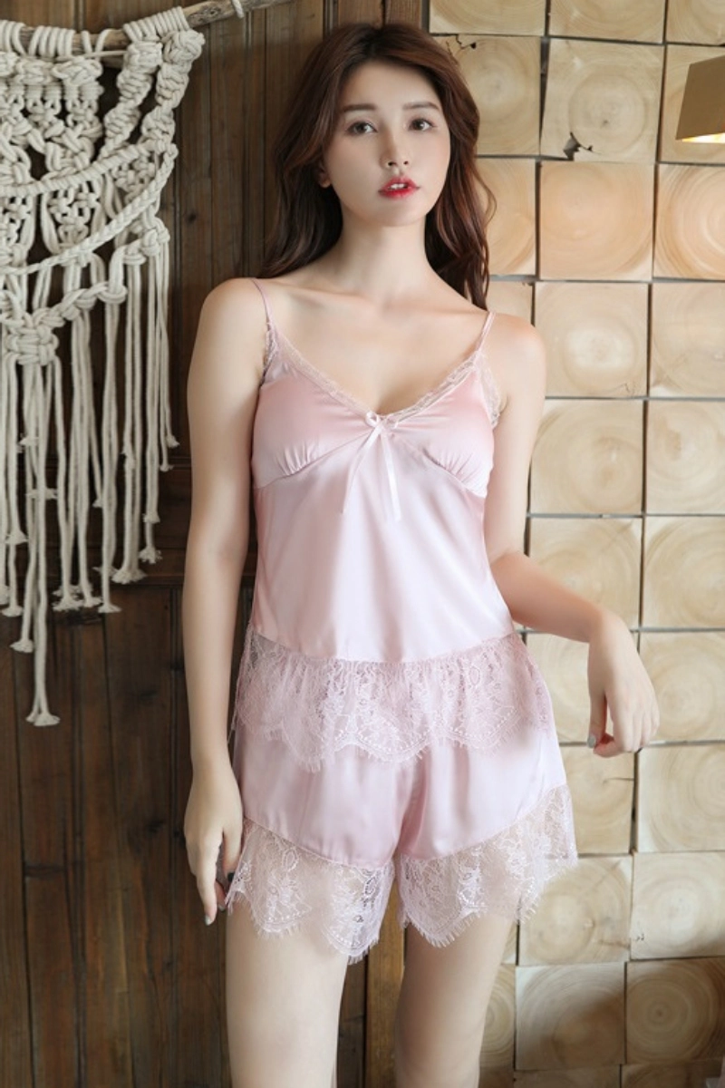 Elegant model in light pink oem burgundy lace pajamas set