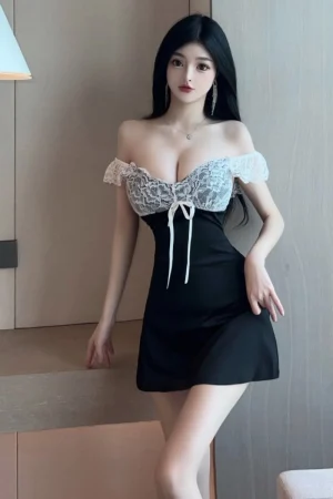 Alt Text：Front view of custom lace Pajama dress with white lace bust and black skirt