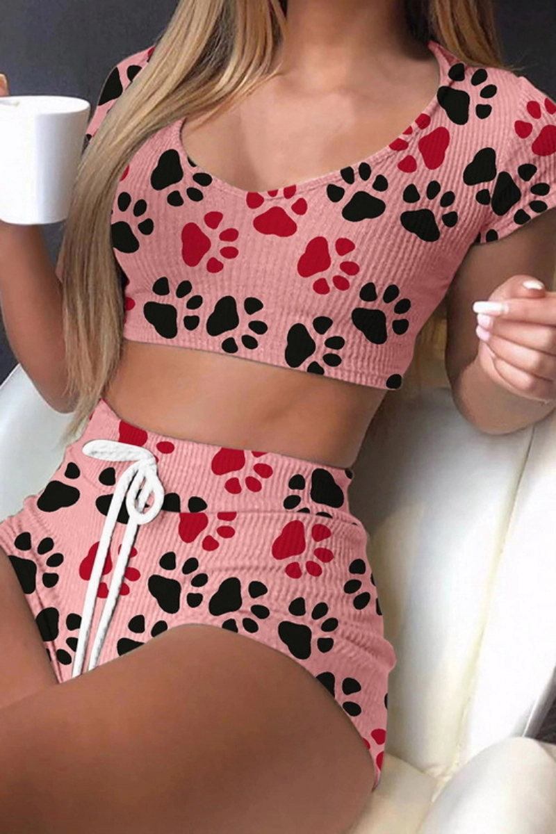Alt Text：Pink b2b lace transparent Pajamas with bold paw print patterns