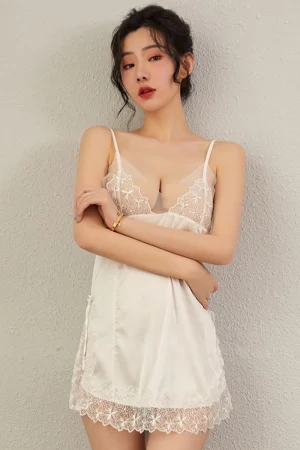 Alt: Soft beige private label chiffon and lace pajamas with floral embroidered top